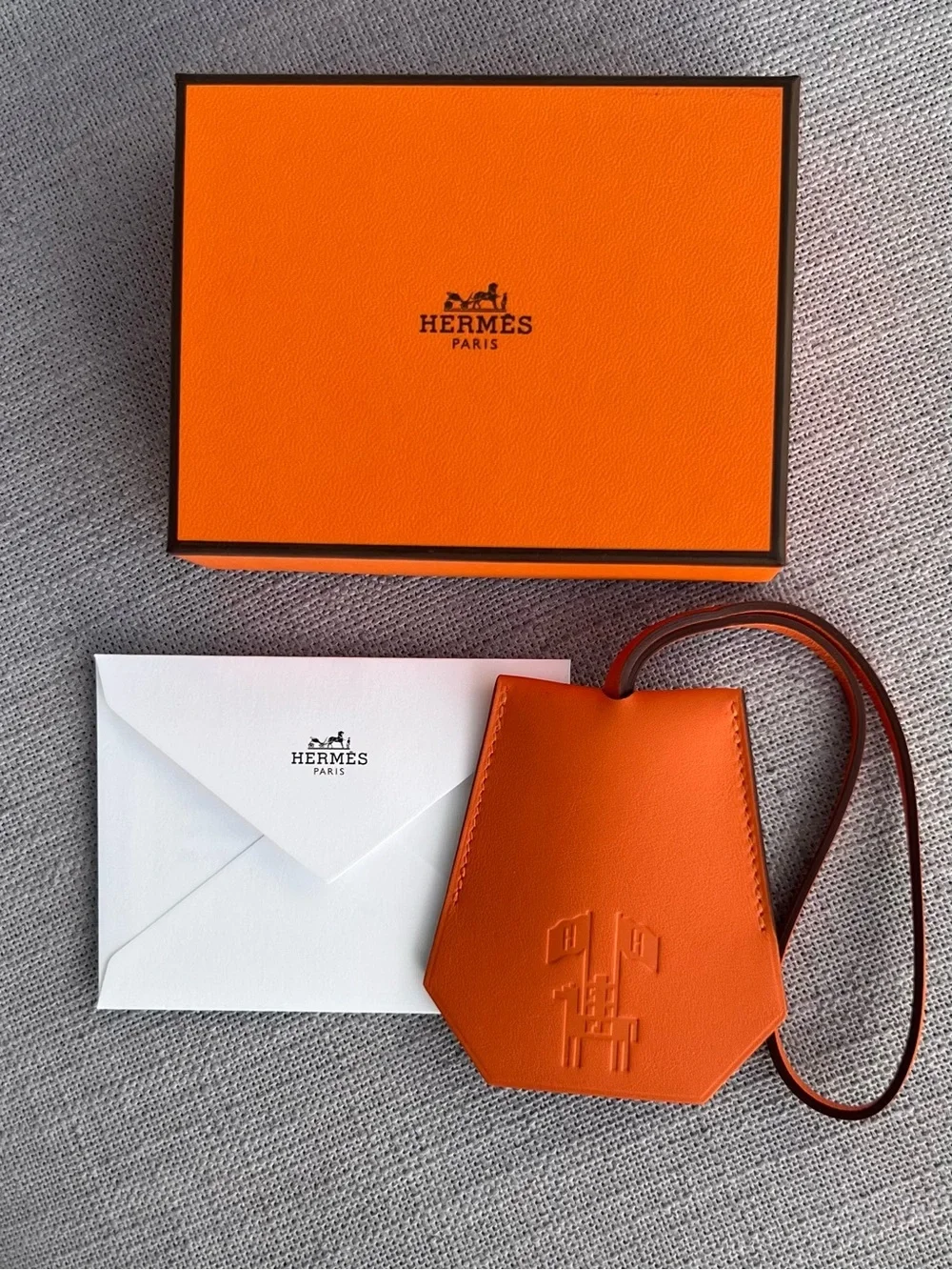 New Hermès Orange Leather Clochette Bag Charm